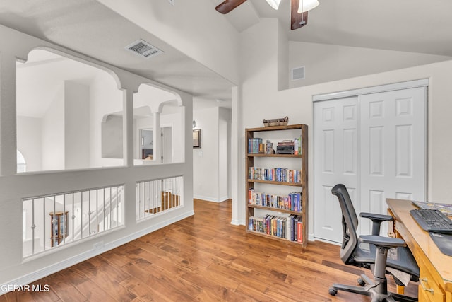 3208 Cascade Point Dr, El Paso, TX 79938 - office area featuring ceiling fan, wood finished floors, baseboards, high vaulted ceiling, and arched walkways