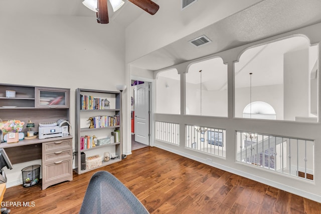 3208 Cascade Point Dr, El Paso, TX 79938 - office featuring ceiling fan, wood finished floors, and a high ceiling