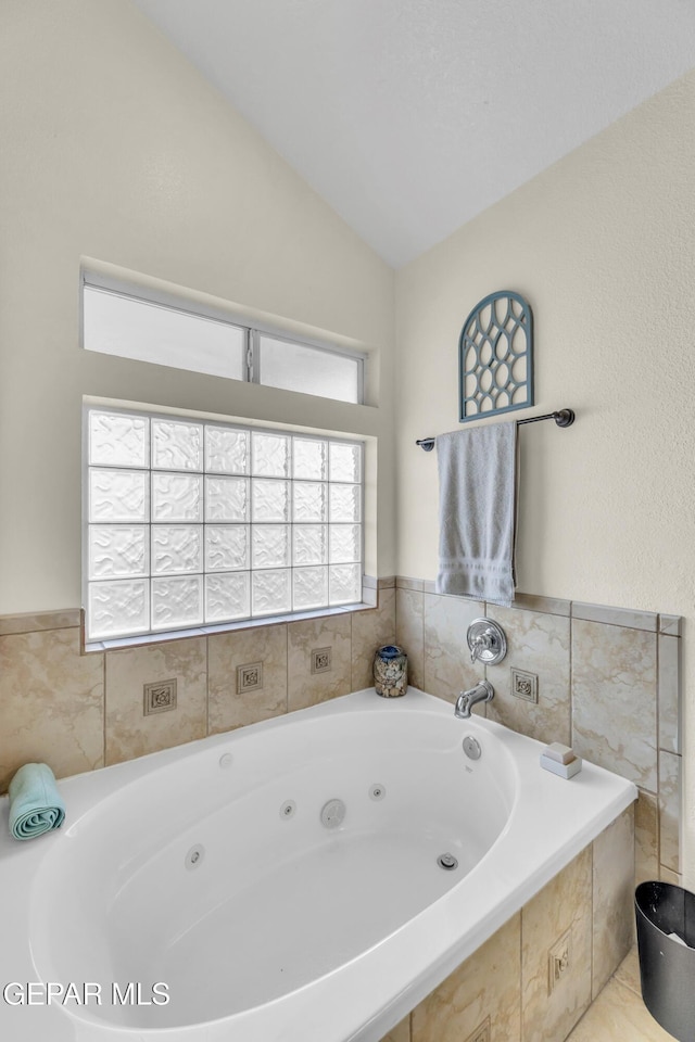 3208 Cascade Point Dr, El Paso, TX 79938 - full bath with lofted ceiling and a tub with jets
