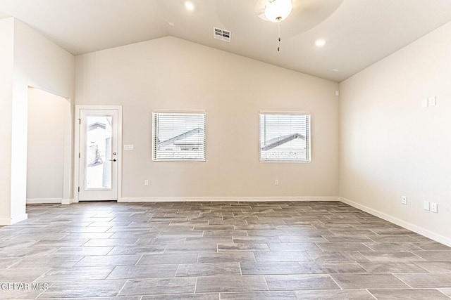 3801 Course St, El Paso, TX 79938 - unfurnished room featuring lofted ceiling, plenty of natural light, a ceiling fan, wood finish floors, and recessed lighting