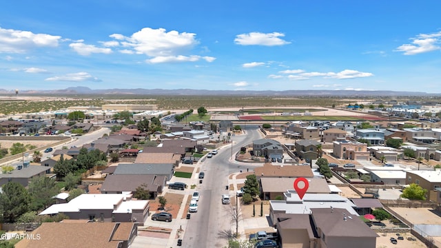 aerial perspective of suburban area featuring a mountainous background