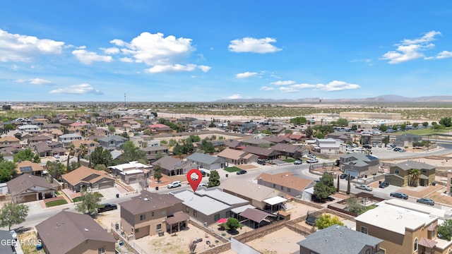 aerial perspective of suburban area featuring mountains