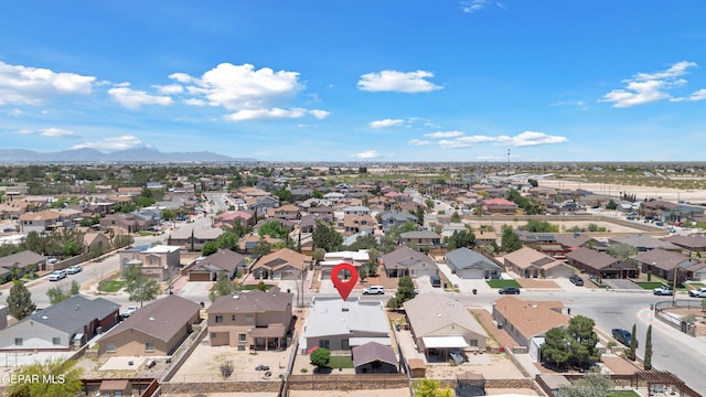 aerial perspective of suburban area with a mountain backdrop