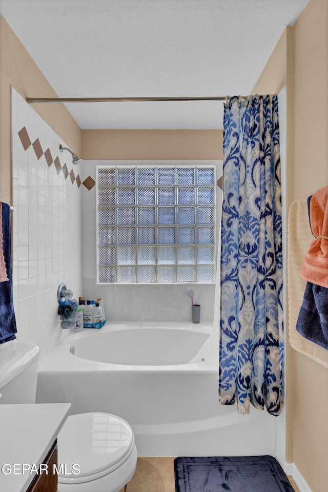 full bathroom with toilet and vanity
