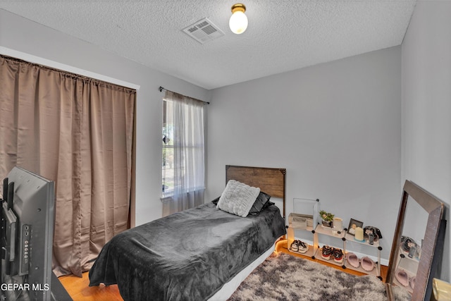 bedroom with a textured ceiling