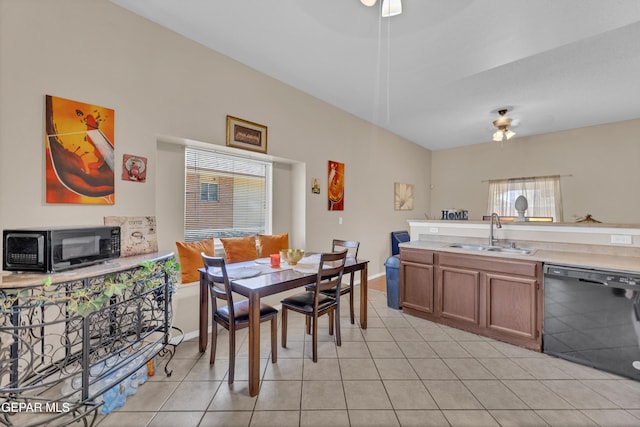 dining room with light tile patterned floors, baseboards, and a ceiling fan