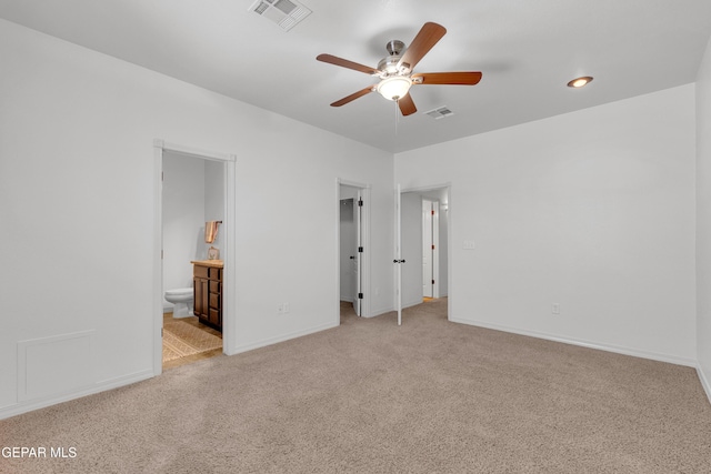 3165 Diego Aidan Dr, El Paso, TX 79938 - unfurnished bedroom featuring carpet, baseboards, ensuite bath, a spacious closet, and a ceiling fan