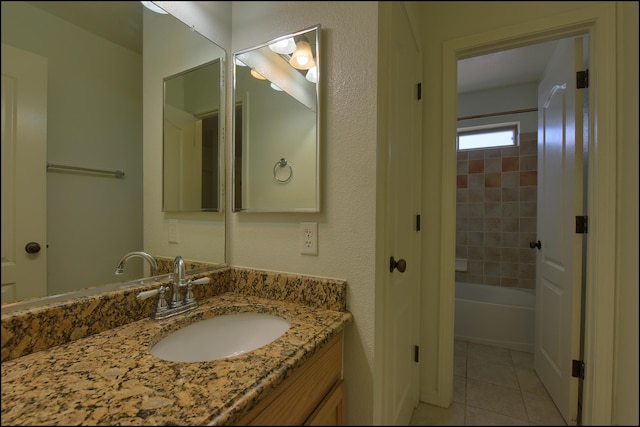 bathroom featuring tile patterned floors and vanity