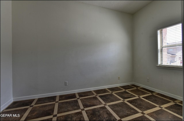 1493 Luz De Sol Dr, El Paso, TX 79912 - spare room with baseboards and inlaid floor details