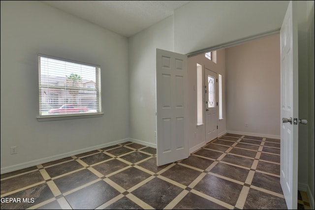1493 Luz De Sol Dr, El Paso, TX 79912 - entrance foyer featuring inlaid floor details and baseboards