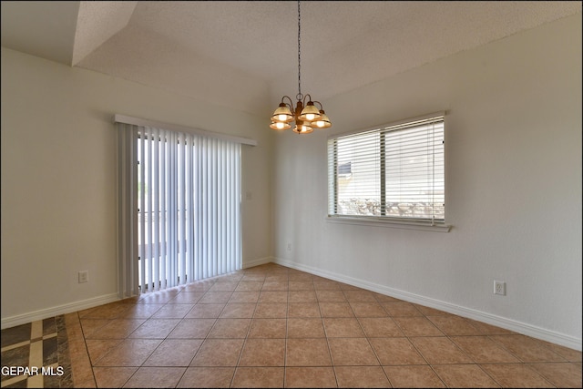 1493 Luz De Sol Dr, El Paso, TX 79912 - empty room with a chandelier, light tile patterned floors, baseboards, and a textured ceiling