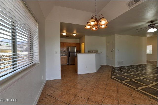 1493 Luz De Sol Dr, El Paso, TX 79912 - kitchen with freestanding refrigerator, tile patterned flooring, open floor plan, and ceiling fan