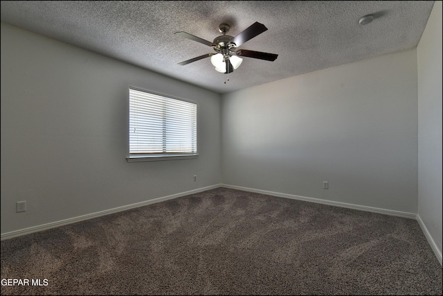 1493 Luz De Sol Dr, El Paso, TX 79912 - unfurnished room featuring ceiling fan, dark carpet, a textured ceiling, baseboards, and a smoke detector