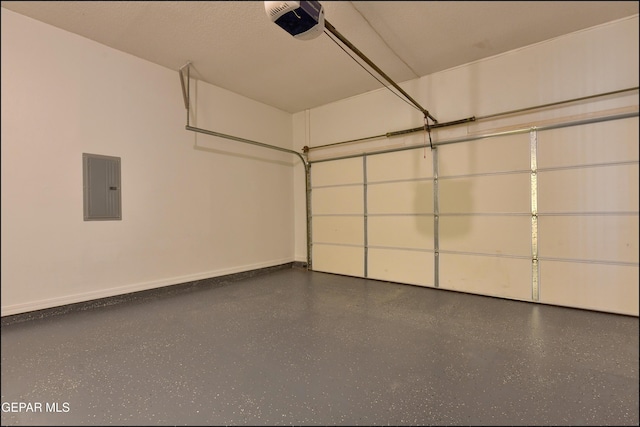 1493 Luz De Sol Dr, El Paso, TX 79912 - garage with a garage door opener, electric panel, and baseboards