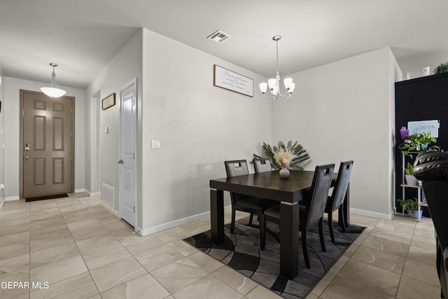 12405 Northumberg Dr, El Paso, TX 79928 - dining room featuring a chandelier and baseboards