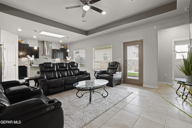 12405 Northumberg Dr, El Paso, TX 79928 - living area featuring light tile patterned flooring, ceiling fan, recessed lighting, plenty of natural light, and baseboards