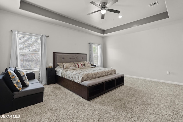 12405 Northumberg Dr, El Paso, TX 79928 - carpeted bedroom with a tray ceiling, baseboards, a ceiling fan, and recessed lighting
