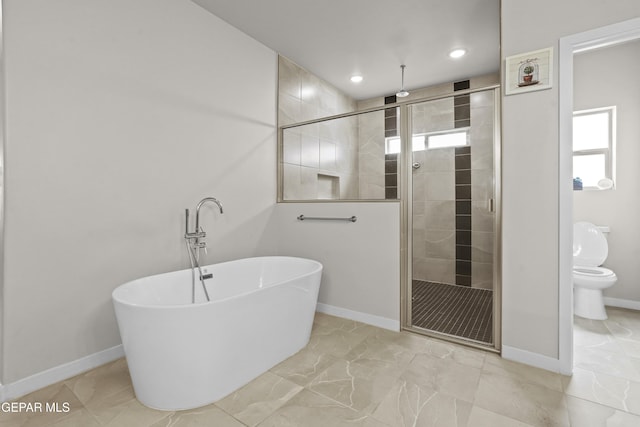 12405 Northumberg Dr, El Paso, TX 79928 - full bathroom with baseboards, a shower stall, a soaking tub, toilet, and recessed lighting