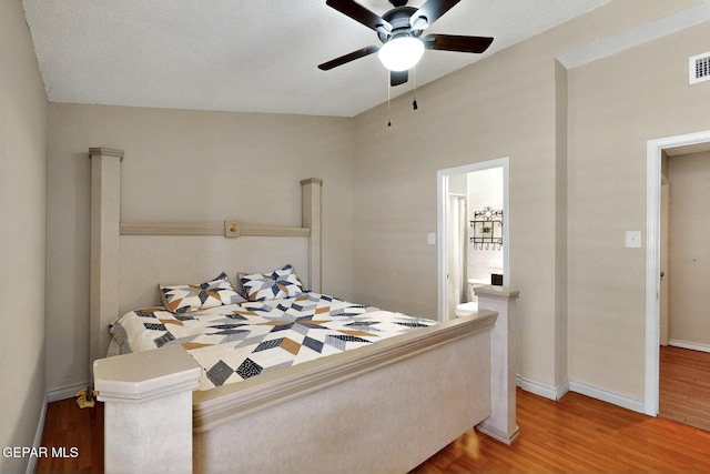 10912 Duke Snider Cir, El Paso, TX 79934 - bedroom featuring wood finished floors, baseboards, and a ceiling fan