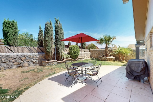 10912 Duke Snider Cir, El Paso, TX 79934 - view of patio / terrace with a fenced backyard and outdoor dining area