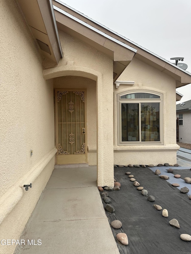 14045 Lago Seco Dr, Horizon City, TX 79928 - doorway to property with stucco siding