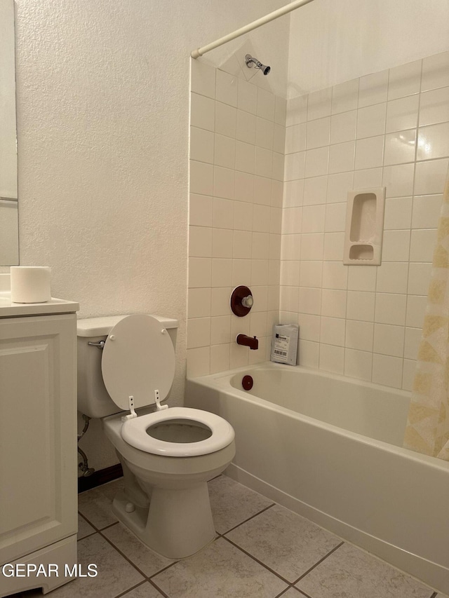 14045 Lago Seco Dr, Horizon City, TX 79928 - full bath featuring a textured wall, tile patterned flooring, shower / bath combination with curtain, toilet, and vanity