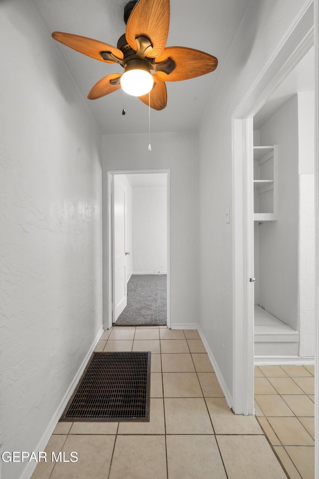 3817 La Luz Ave, El Paso, TX 79903 - corridor with light tile patterned flooring and baseboards