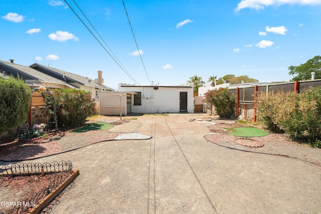 3817 La Luz Ave, El Paso, TX 79903 - back of house with a patio area and a fenced backyard