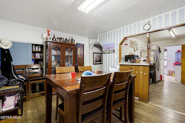 564 Chula Vista St, El Paso, TX 79915 - dining area featuring wood finished floors