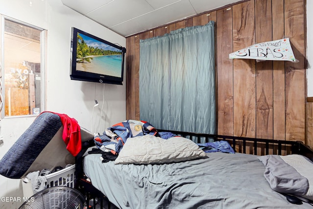 564 Chula Vista St, El Paso, TX 79915 - bedroom with wood walls