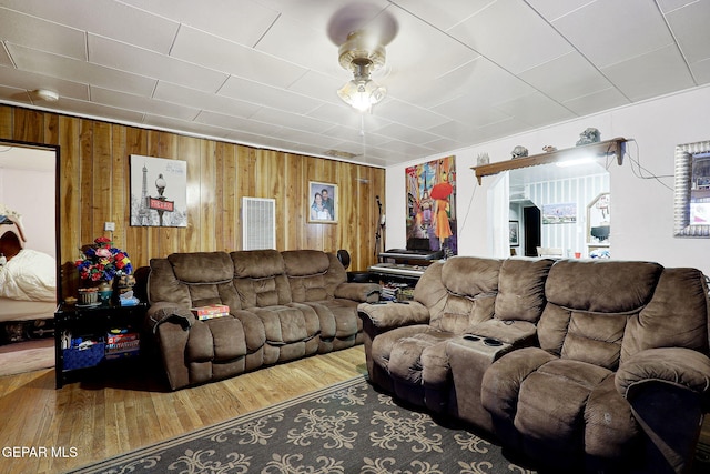 564 Chula Vista St, El Paso, TX 79915 - living area with wood walls and wood finished floors