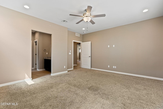 14172 Peyton Edwards Ave, El Paso, TX 79938 - unfurnished bedroom featuring light colored carpet, recessed lighting, baseboards, a ceiling fan, and ensuite bath