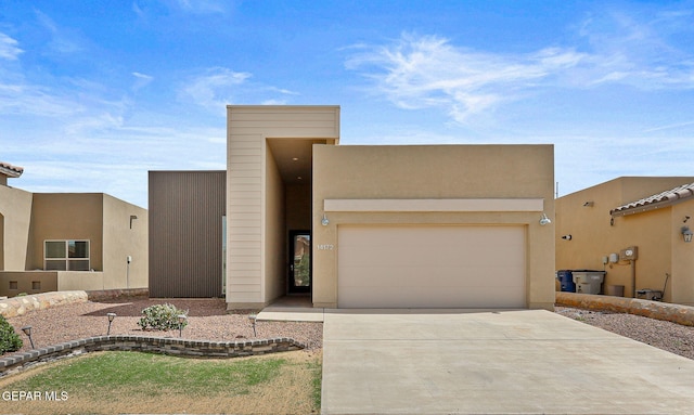 14172 Peyton Edwards Ave, El Paso, TX 79938 - view of front of house with driveway and an attached garage