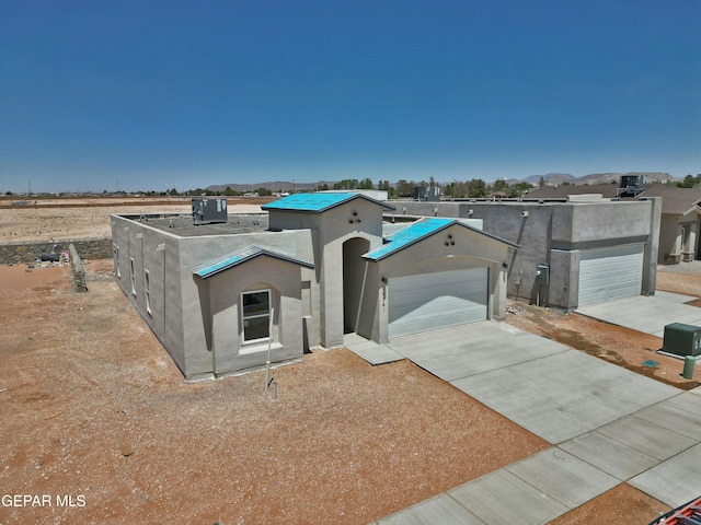 15341 Idea Ln, El Paso, TX 79938 - pueblo revival-style home with stucco siding and concrete driveway