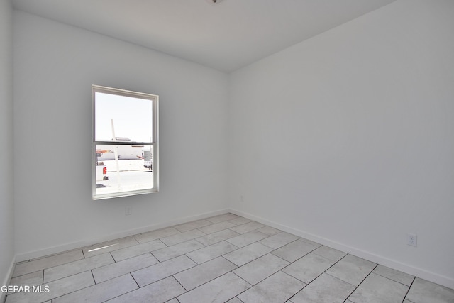 15341 Idea Ln, El Paso, TX 79938 - unfurnished room featuring baseboards and light tile patterned flooring
