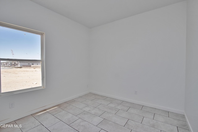 15341 Idea Ln, El Paso, TX 79938 - empty room featuring baseboards and light tile patterned floors