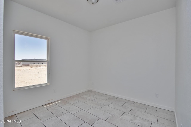 15341 Idea Ln, El Paso, TX 79938 - unfurnished room featuring baseboards and light tile patterned flooring