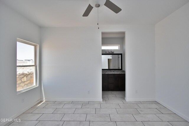15341 Idea Ln, El Paso, TX 79938 - spare room with ceiling fan, light tile patterned flooring, and baseboards