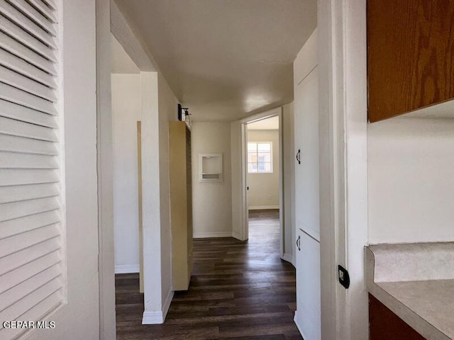 5017 Sierra Madre Dr, El Paso, TX 79904 - corridor featuring dark wood-style flooring, a heating unit, and baseboards