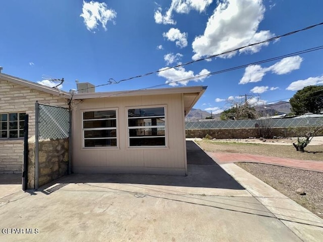5017 Sierra Madre Dr, El Paso, TX 79904 - view of property exterior with fence and stone siding