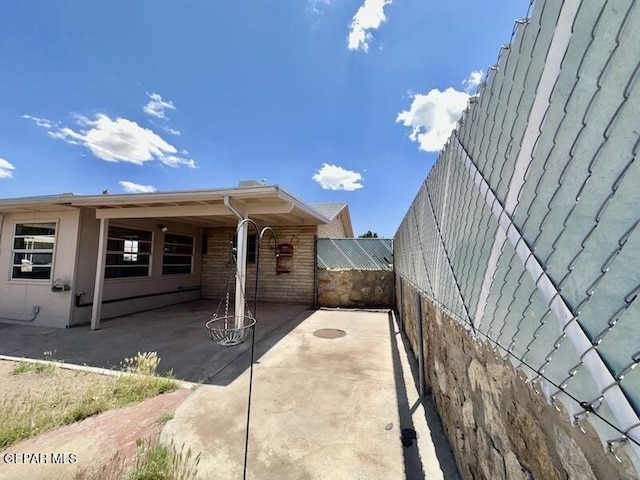 5017 Sierra Madre Dr, El Paso, TX 79904 - view of home's exterior featuring a patio and a fenced backyard