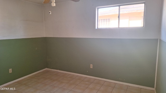 223 Kelvin Ave, El Paso, TX 79915 - spare room with ceiling fan, tile patterned floors, and baseboards
