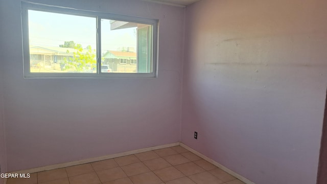 223 Kelvin Ave, El Paso, TX 79915 - spare room with plenty of natural light and baseboards