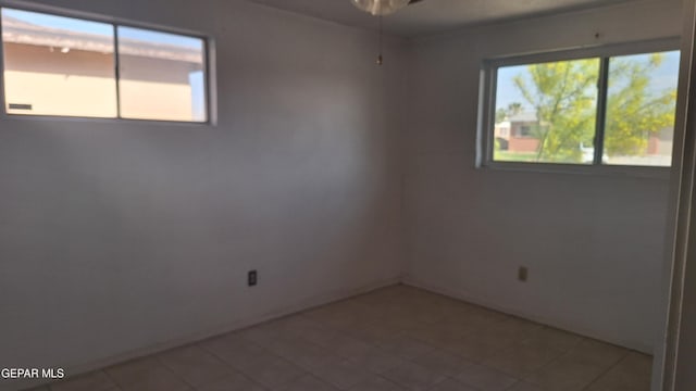 223 Kelvin Ave, El Paso, TX 79915 - empty room with ceiling fan and baseboards