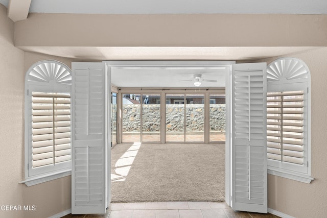 10740 White Sands Dr, El Paso, TX 79924 - entryway with tile patterned floors, baseboards, and a ceiling fan