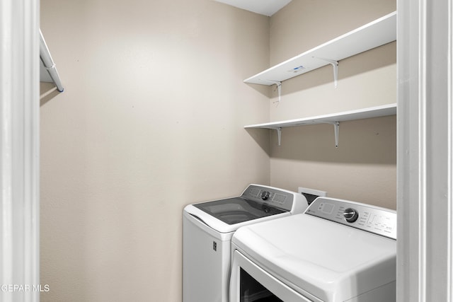 10740 White Sands Dr, El Paso, TX 79924 - laundry area with separate washer and dryer