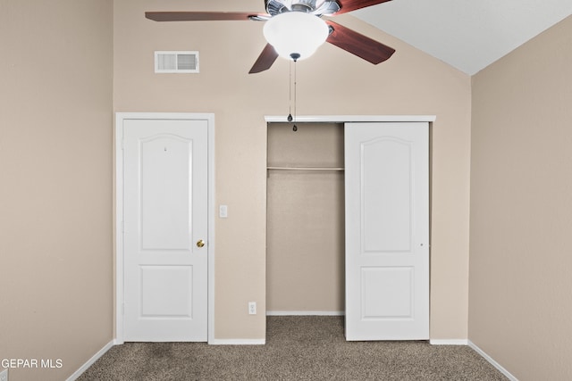 10740 White Sands Dr, El Paso, TX 79924 - unfurnished bedroom featuring carpet floors, a closet, baseboards, ceiling fan, and vaulted ceiling