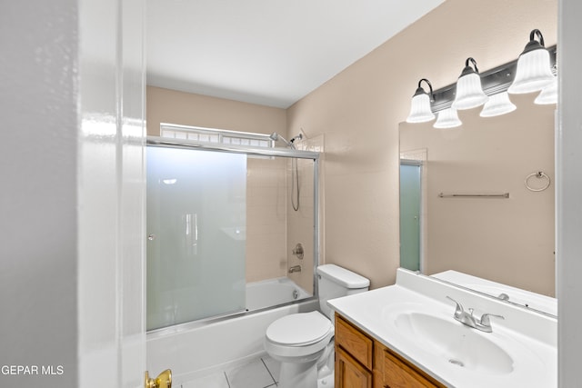 10740 White Sands Dr, El Paso, TX 79924 - full bathroom with toilet, enclosed tub / shower combo, vanity, and tile patterned floors