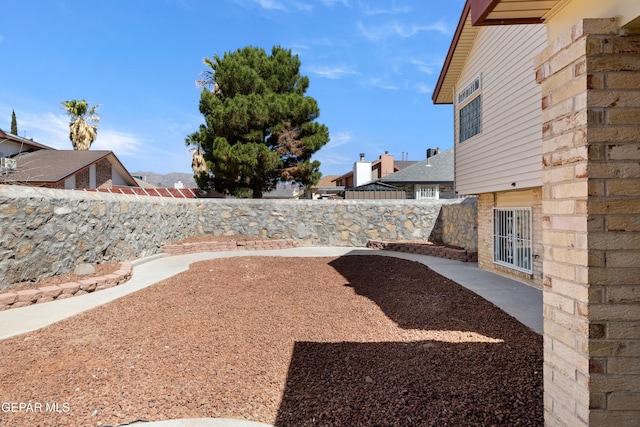 10740 White Sands Dr, El Paso, TX 79924 - fenced backyard with a patio