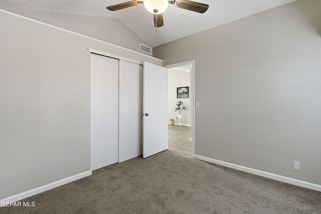 819 Los Surcos Rd, El Paso, TX 79907 - unfurnished bedroom with lofted ceiling, carpet flooring, a closet, ceiling fan, and baseboards
